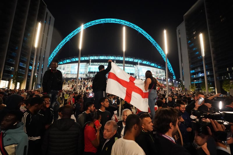 England fans celebrate outside Wembley Stadium after England qualified for the Euro 2020 final.