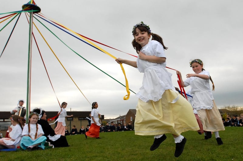 Year 4 pupils were performing a Maypole dance in period costume in this view from 15 years ago.