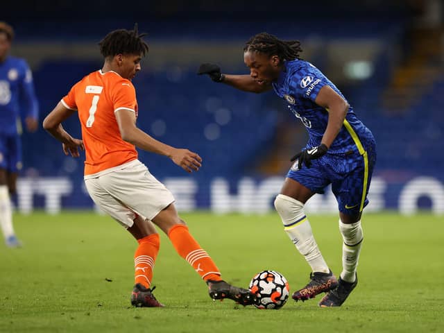 Darren Francis of Blackpool tackles Silko Thomas of Chelsea during the FA Youth Cup sixth round match at Stamford Bridge on February 24, 2022 (Warren Little/Getty Images)