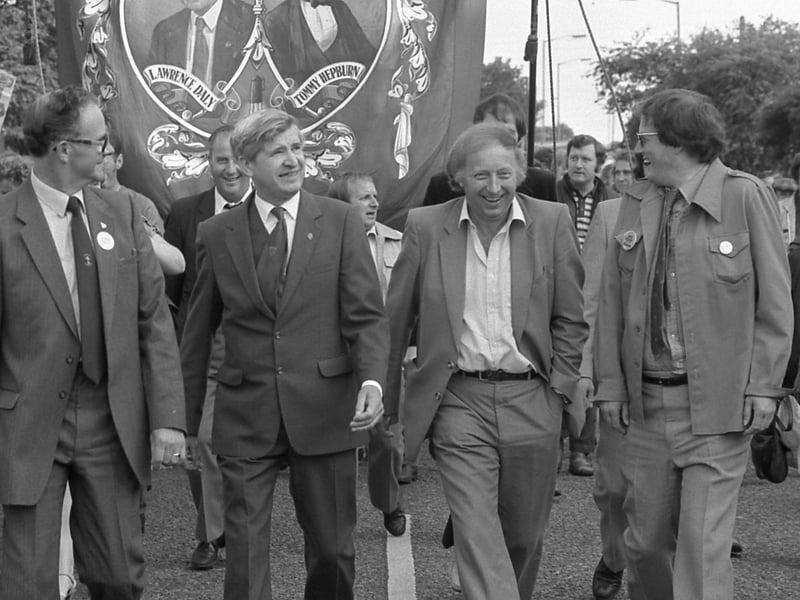 NUM leader Arthur Scargill, second right in the front row, chuckles while visiting Easington in July 1984.