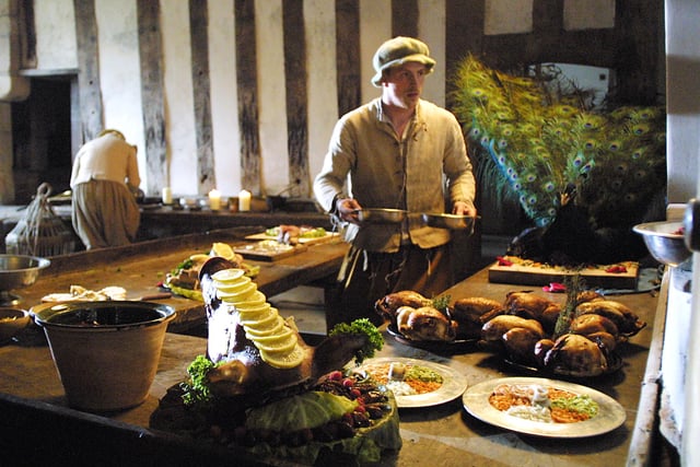 Alex Langlands of the BBC2 production 'Tales from the Banqueting Hall' brought some of the finished dishes to the kitchen before the feast is served at Haddon Hall back in 2006