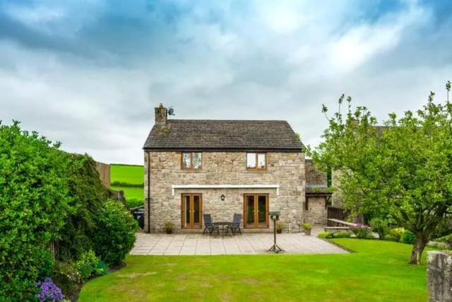This four bedroom barn conversion offers lots of open plan living spaces and glorious panoramic views of the Lancashire countryside. The wonderfully renovated property offers beautiful high vaulted ceilings, exposed wooden beams and lintels, as well as French doors, leading into the pristine rear garden. Listed on OntheMarket for 450,000 GBP