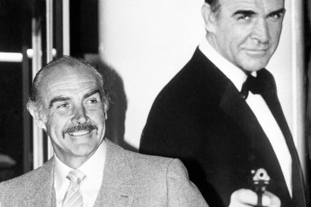 Backed by his own likeness as James Bond in 1962, actor Sean Connery, 53 son of a Scottish mill-worker, whose latest film, Never Say Never Again opens at the Warner Theatre, Leicester Square.