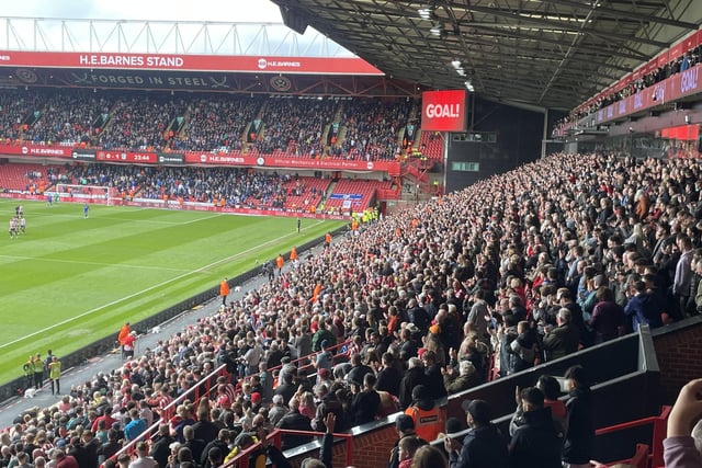 Sheffield United fans celebrate their equalising goal against Cardiff City