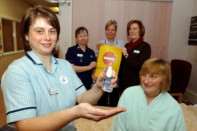 In 2005 healthcare assistant Amanda Foteringham helped to launch the 'clean your hands campaign' at Doncaster Royal Infirmary. Looking on are patient Linda Brown, of South Kirkby, and back row, from left, Matron-Medical Directorate, Jo McQuade, staff nurse Sandra Miller and Lisa Young, lead nurse infection control.