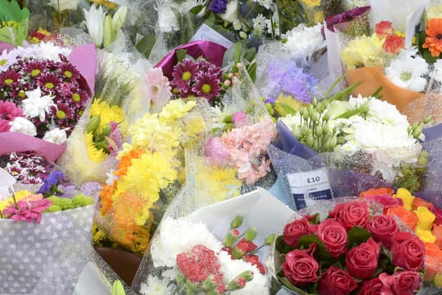 Flowers laid at scene of a murder on Woodthorpe Road in Sheffield.