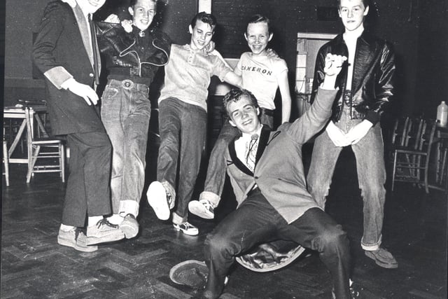 Parson Cross Teddy Boys stage a sponsored Rock and Roll in aid of St Cecilia's Church Boiler Fund. Pictured left to right are Roger Peacock, aged 14, Andrew Ledger, 14, Paul Wilson, 15, Cameron Whiteley, 14, 14-year-old Tony Brookes, and, front, Martin Ledger, 16, on Aug 25, 1979.