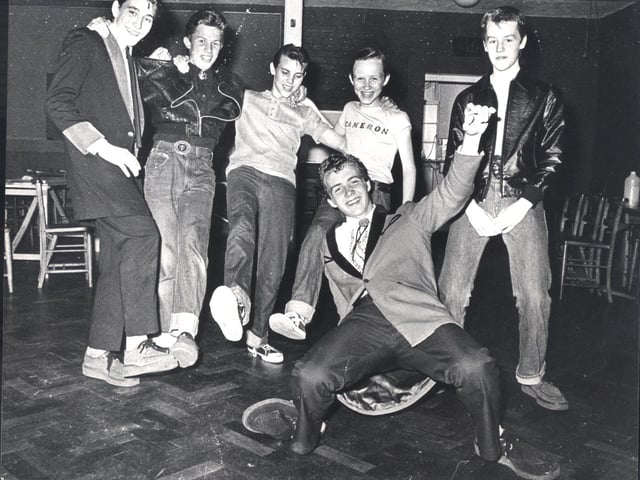 Parson Cross Teddy Boys stage a sponsored Rock and Roll in aid of St Cecilia's Church Boiler Fund. Pictured left to right are Roger Peacock, aged 14, Andrew Ledger, 14, Paul Wilson, 15, Cameron Whiteley, 14, 14-year-old Tony Brookes, and, front, Martin Ledger, 16, on Aug 25, 1979.