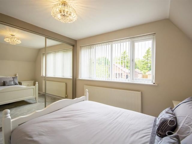 The second bedroom also has fitted wardrobes.