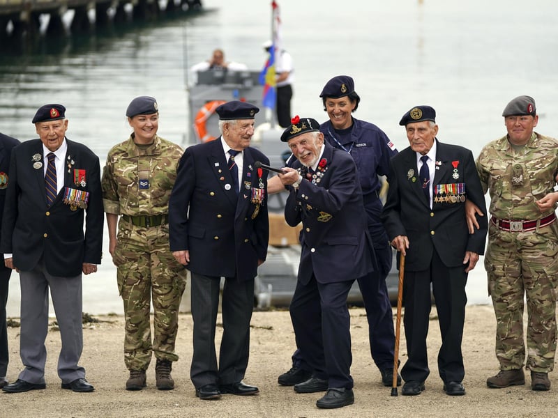 D-Day veterans are welcomed to the Portsmouth Historic Dockyard to commemorate the 77th anniversary of the Normandy Landings. Picture date: Sunday June 6, 2021. Picture: Steve Parsons/PA Wire