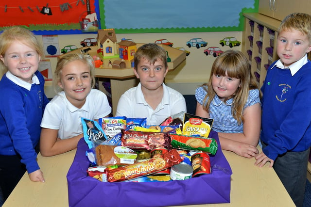 Eskdale Academy pupils (left to right) Amber Flounders, Lilyann Stevens, Finley Simpson, Maddison Bavin and Jackson Cairns with items donated to their Harvest Festival. Remember this from six years ago?