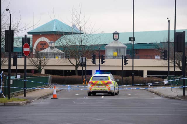 Scene of fatal car crash at Meadowhall Sheffield where two are believed dead after the car they were travelling in entered the river Don