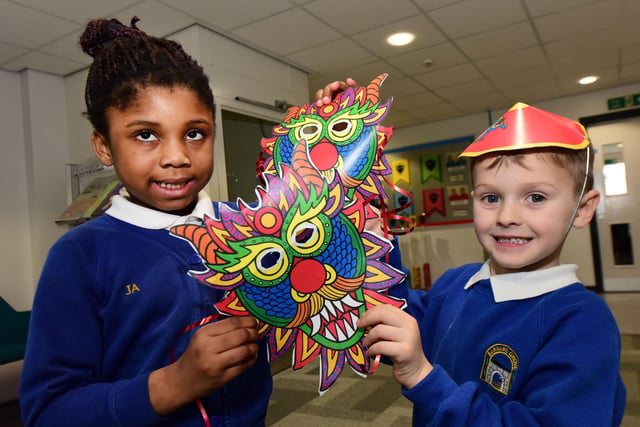 Year 1 pupils Jessica Arnold and Harrison Gray can be seen with their dragon masks as part of the school's Chinese New Year celebrations in 2017.