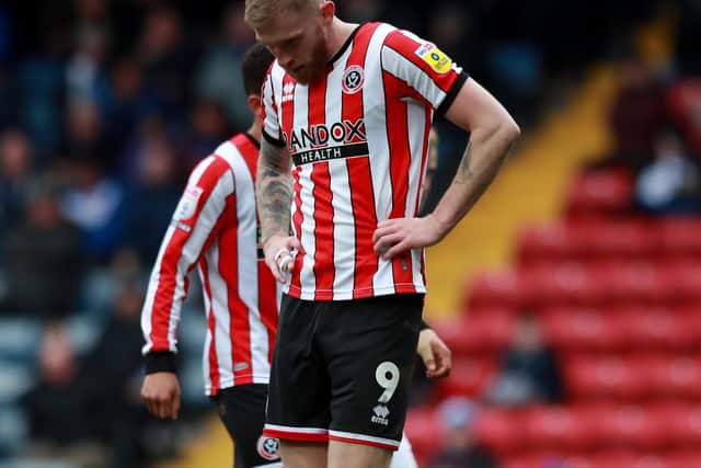 Sheffield United's Oli McBurnie looks dejected following the final whistle: Simon Bellis / Sportimage