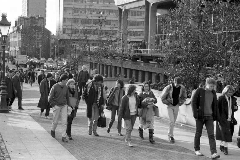 University of Edinburgh students strolling around the Student Centre in Bristo Square, December 1985.