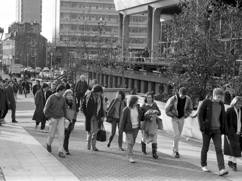 University of Edinburgh students strolling around the Student Centre in Bristo Square, December 1985.