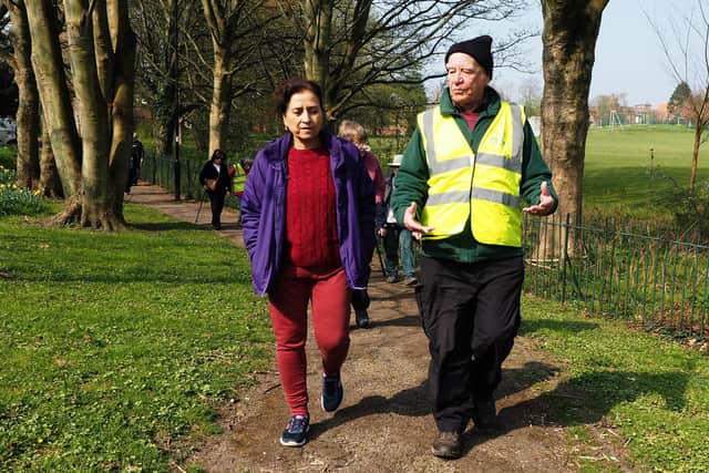 Step Out Sheffield Health Walk in Totley:Walk leader David Jones chatting to a fellow walker in 2019