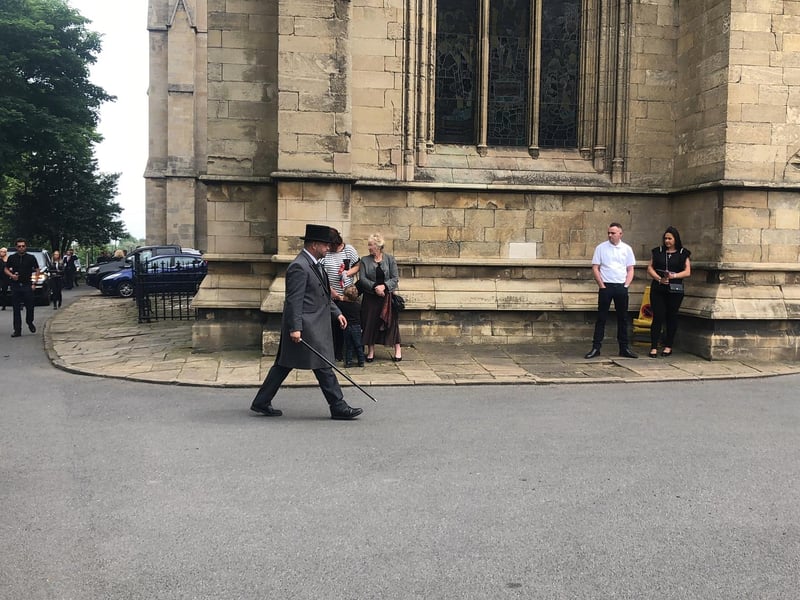 The cortege arrives at the minster