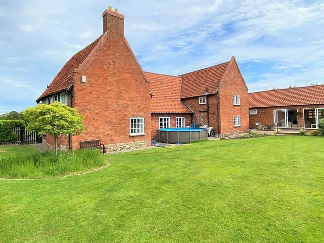 A view from the back of the property. It gives you an idea of how spacious the lawn is.
