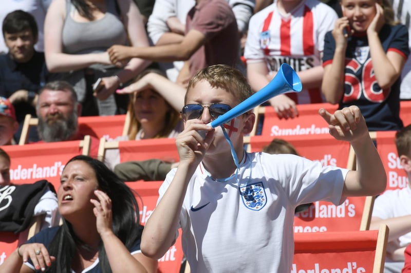 England fans watching the team in action at the Sunderland BID Fanzone, Low Row.