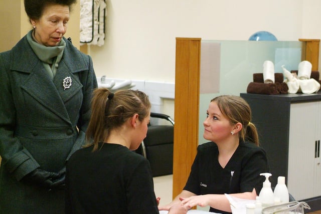 Princess Anne visited Doncaster College. Princess Anne views the work of hair and beauty students in 2008