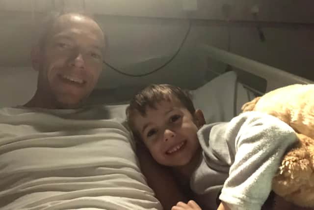 Nick Dawe, from Sheffield, with his son Oliver as they spent Christmas Day night in hospital following the brain tumour diagnosis (Picture: Brain Tumour Research)