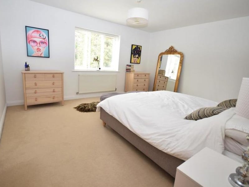 The first bedroom is your own personal sanctuary, where you can retreat and rest. It boasts a large walk-in wardrobe, and has plenty of natural light from a uPVC window that overlooks the front lawn.
