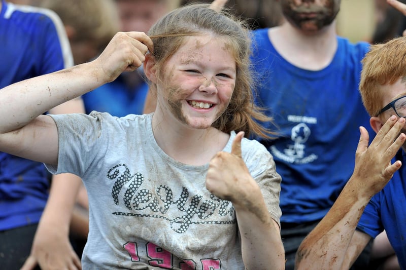 A High Tunstall College of Science pupil taking part in the muddy challenge event.
