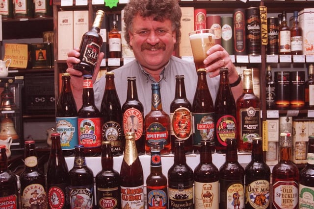 John Mitchell of Mitchell's Wine Store with his selection of English beers