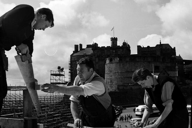 Workmen are pictured erecting scaffolding on the castle esplanade for the Military Tattoo in 1962.