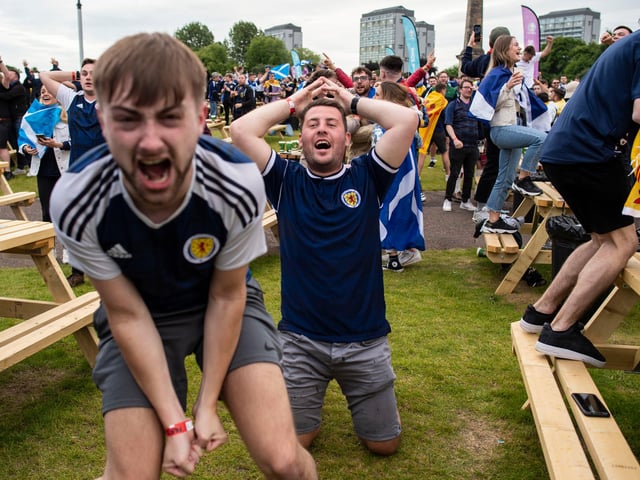 Scotland fans celebrate Callum McGregor's goal equaliser against Croatia at the Euro Fan Zone during Scotland's Euro 2020 campaign, at Glasgow Green, on June 22, 2021.