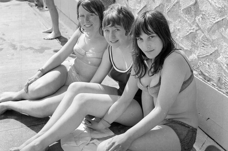 Three holidaymakers on Portobello Beach in 1965.