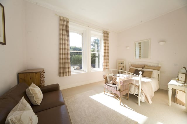 Bedroom two is a generous double room with immaculate decor, decorative coving, with beautiful sash windows to provide maximum light in this sizeable room.