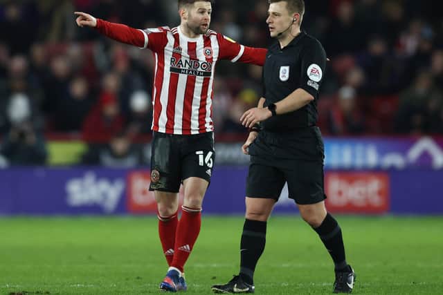 Oliver Norwood questions referee Josh Smith during Sheffield United's game against Nottingha Forest at Bramall Lane: Darren Staples / Sportimage