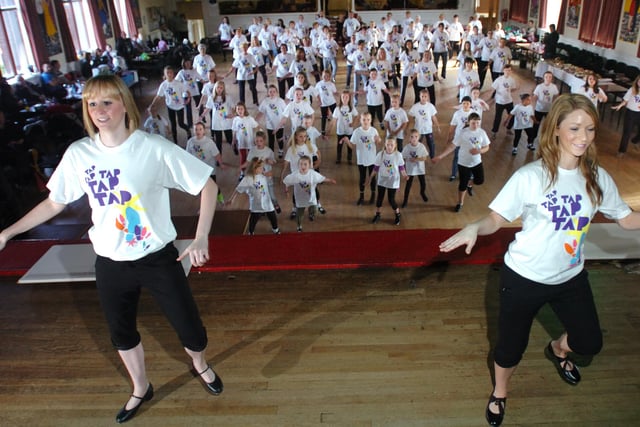 Were they record breakers? Kimberly Cowan and Bethany Ainsley, right, are pictured leading 90 dancers in Easington CW Social Club in their bid for the world record for the largest tap dance across multiple venues in aid of Children in Need.