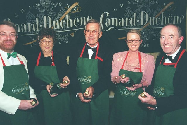 In the truly elite realm of world record attempts is this effort to set a new mark for Champagne cork popping. Pictured taking on the challenge during a charity dinner at Sheffield's Cutlers' Hall in November 1999 are Martin Green, Maureen Fletcher, Leonard Monfredi,Allison Fletcher and Michael Smith