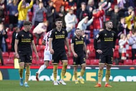 Sheffield United's players look dejected after watching Liam Delap seal their fate at Stoke City: Andrew Yates / Sportimage