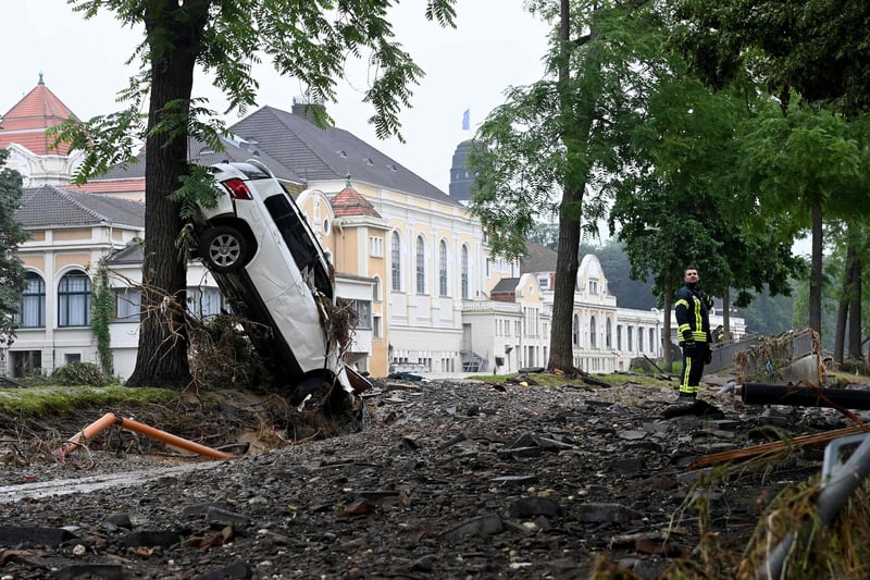 The death toll from devastating floods in Europe soared to at least 118 on July 16, with at least 103 dead in Germany. (Photo by CHRISTOF STACHE / AFP)