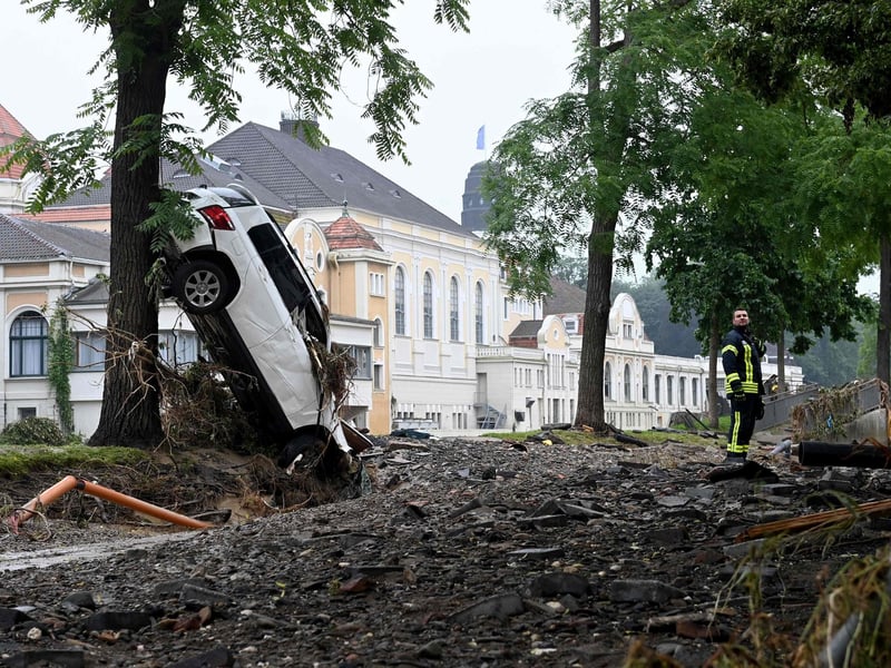 The death toll from devastating floods in Europe soared to at least 118 on July 16, with at least 103 dead in Germany. (Photo by CHRISTOF STACHE / AFP)