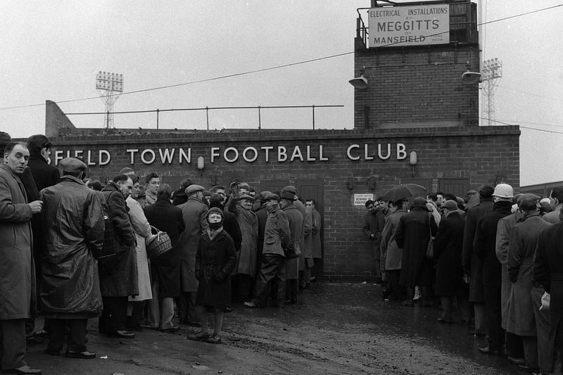 Fans queue to get into the ground in 1962.