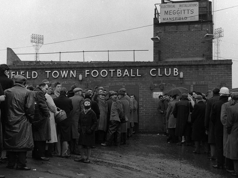 Fans queue to get into the ground in 1962.