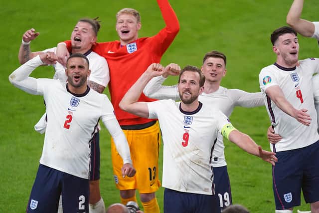 England's Harry Kane, Kyle Walker and team-mates celebrate winning the UEFA Euro 2020 semi final match against Denmark at Wembley.
