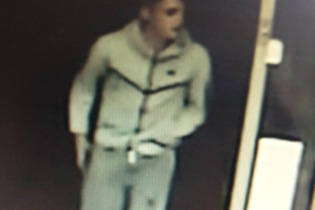 Another image of one of the males police would like to speak to after a sign outside the shop was kicked and stamped on during an on October 17 incident