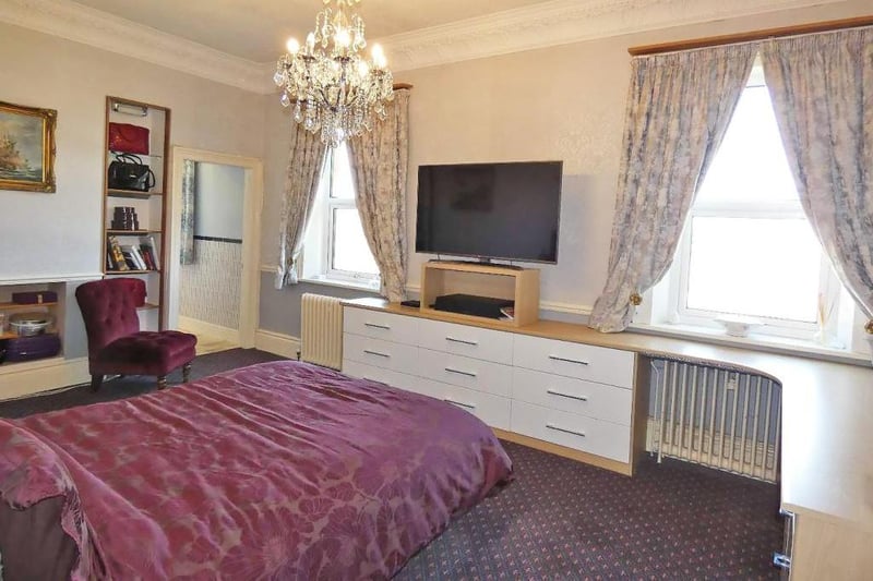 The master bedroom, on the first-floor, benefits from an en-suite and dressing room.