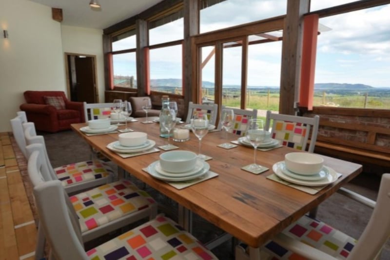 The large dining table comfortably seats seven, with gorgeous views.
