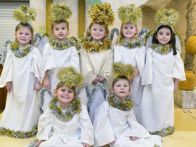 School Christmas productions were a little less slick than they were when I was at school - and there were fewer parts. You were either Mary, Joseph, a wise man, a shepherd, the Innkeeper or..... an angel (just like these little angels). So it was tinsel everywhere!