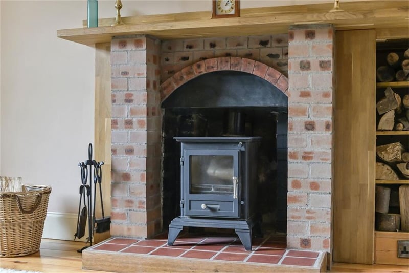 Wood burning stove in living room.