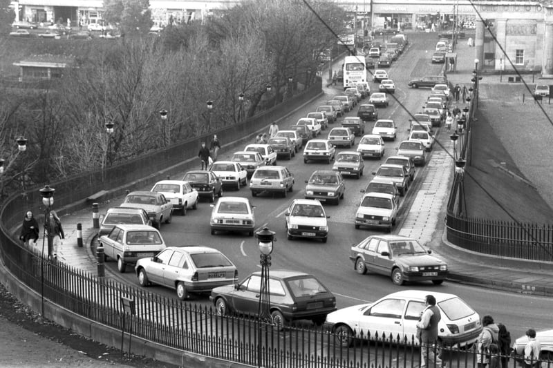 Traffic struggles on The Mound in Edinburgh because of double-parking - cars parked on either side of the road - in October 1989.
