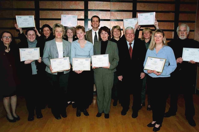 Chris Finch (rear centre) of the Westfield Sharks basketball team and Graham Moore, chairman of the Sheffield-based Westfield Health scheme, presenting the annual Westfield Travel Scholarships for 1999 to nurses from Sheffield, Nottingham, Chesterfield, Scunthorpe and Leicester, who were travelling to the USA, Australia, Holland and Israel