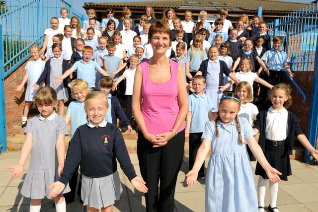 Mortimer Primary School retiring deputy headteacher Pam Appleby was serenaded by pupils from the school choir in this 2013 scene. Remember it?
